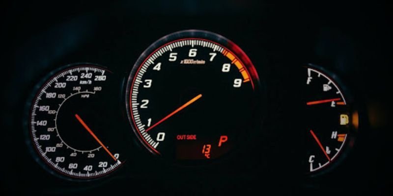 A car's speedometer showcasing better fuel efficiency